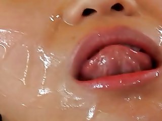 Taiwanese girl receives fuck and facial on red couch